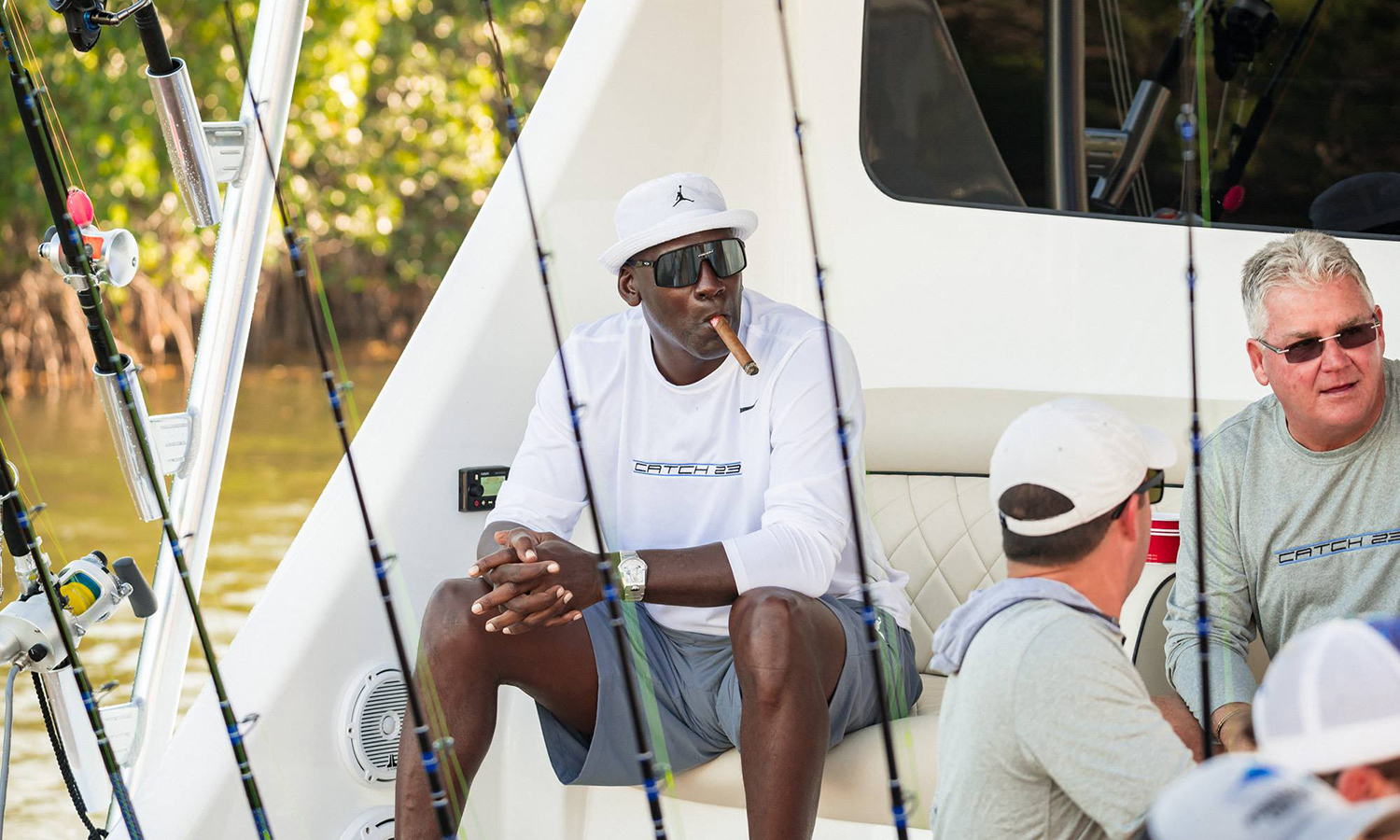 michael jordan trades in basketballs for boats at white