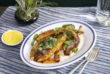  The cumin lamb and corn ribs at NiHao Baltimore, now open in Canton. Photography by Melissa Hom